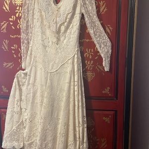 Custom long gown by Martin MccreA worn onetime size Large all tea stained lace.